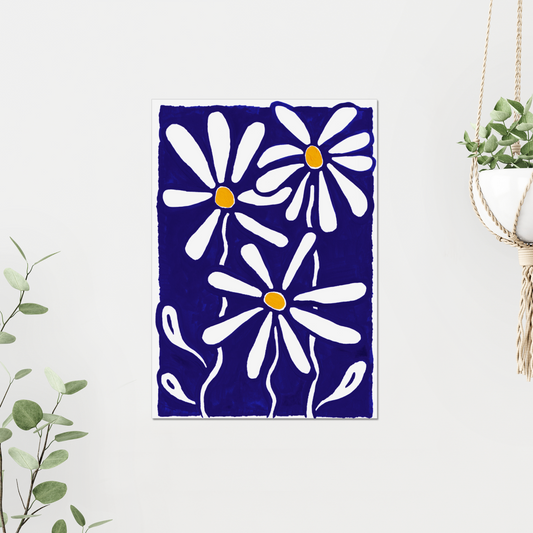 Daisy birth month flower art print for April, featuring bright white daisies on a navy blue background, with a pop of yellow. Tthis cheerful botanical print adds elegance and color to any room.