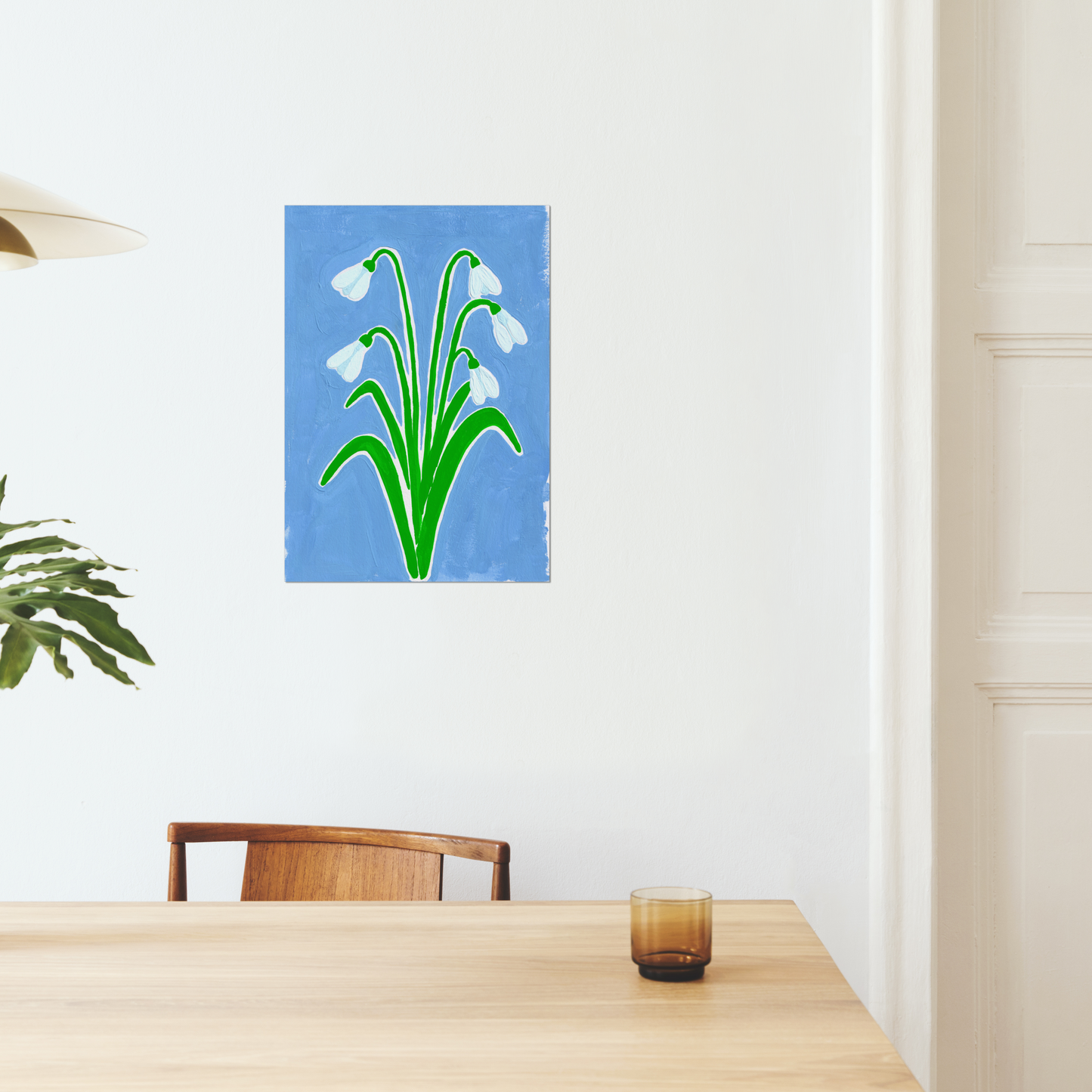 Snowdrop January birth month flower art print, featuring delicate Snowdrop blooms on a serene blue background. Symbolizing hope and purity, this botanical wall art adds elegance and meaning to any room.